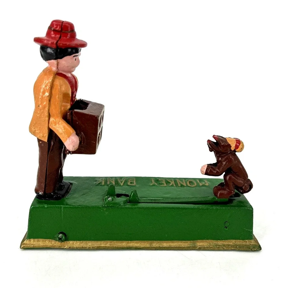 ORGAN GRINDER MONKEY BANK Cast Iron Works Great‎